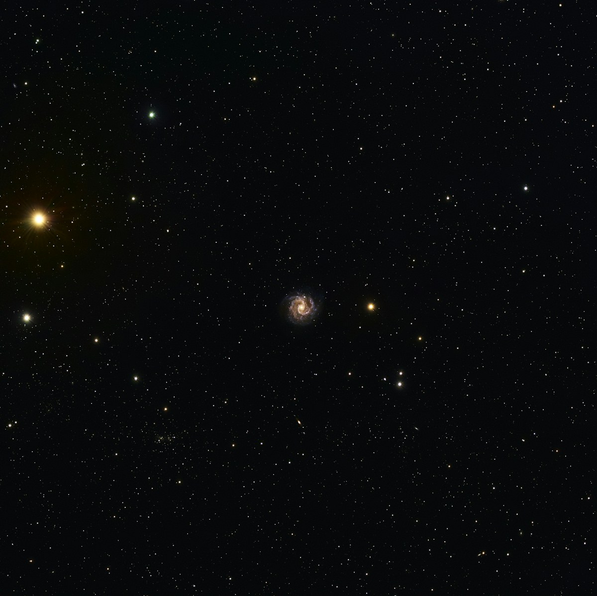 A distant spiral galaxy surrounded by stars. Illustrative photograph, not an image of the specific event or discovery reported.